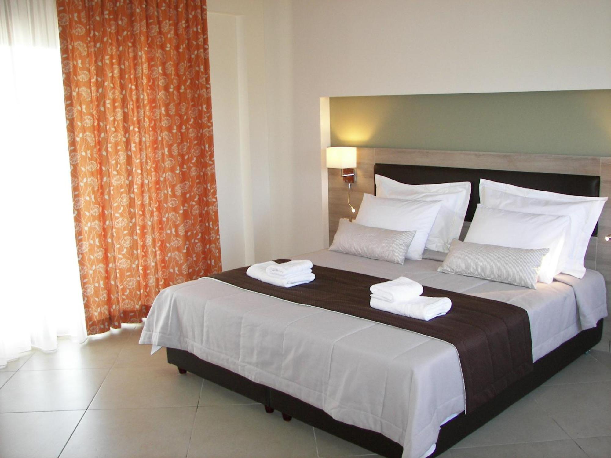 Skinari Apartments Monolia Phòng bức ảnh